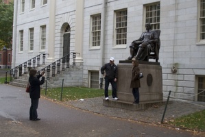 315-0562 Posing with Statue of John Harvard.jpg